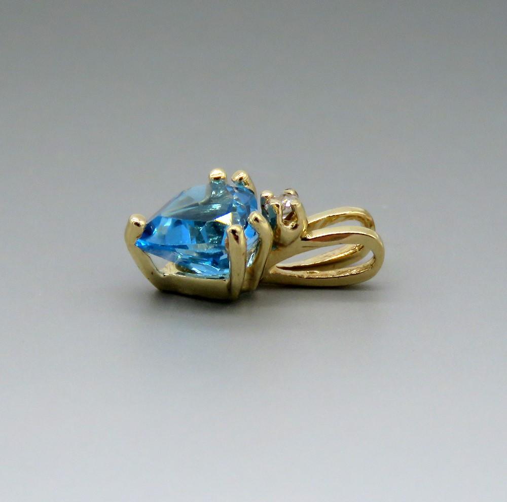 Charming 14k Yellow Gold Blue Topaz Diamond Heart Pendant