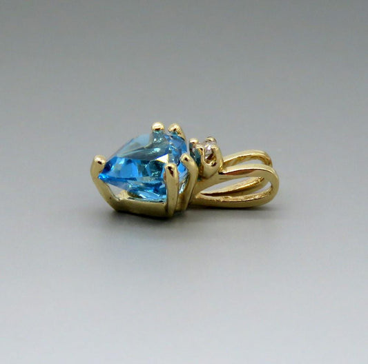 Charming 14k Yellow Gold Blue Topaz Diamond Heart Pendant