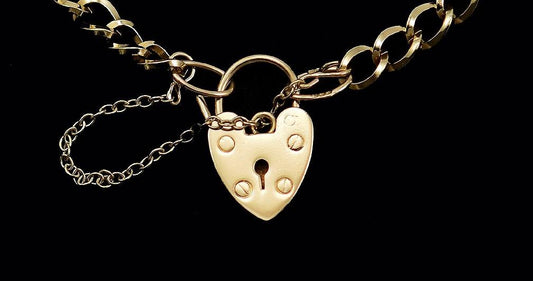 Vintage 1977 English 9k Yellow Gold Charm Bracelet with Heart Shaped Lock