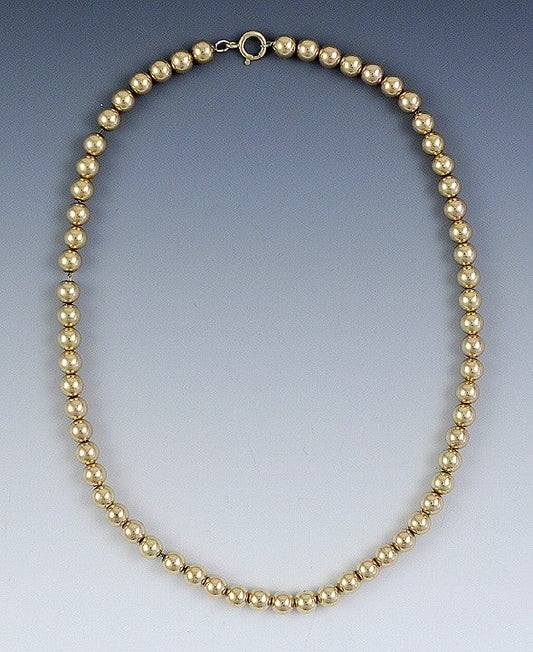 Fantastic Modern Necklace Strand of 6.5mm 14K Gold Beads
