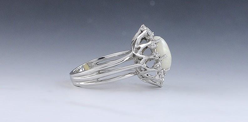 Elegant Opal Cabochon and 14k White Gold Diamond Halo Ring Size 6