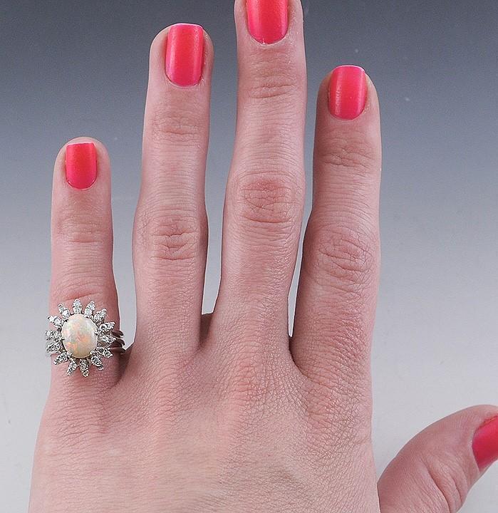 Elegant Opal Cabochon and 14k White Gold Diamond Halo Ring Size 6
