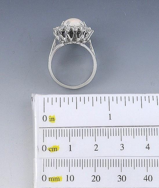 Elegant Opal Cabochon and 14k White Gold Diamond Halo Ring Size 6