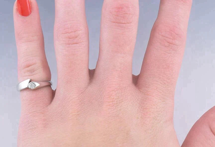 Sleek Modern Platinum & Diamond Bypass Ring