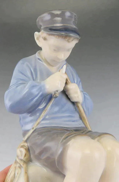 Royal Copenhagen Porcelain Christian Thomsen 905 Boy Whittling Sticks Figurine