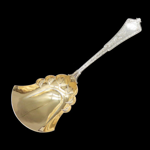 Tiffany & Co gold washed sterling silver serving spoon in the Persian pattern, made in 1877.