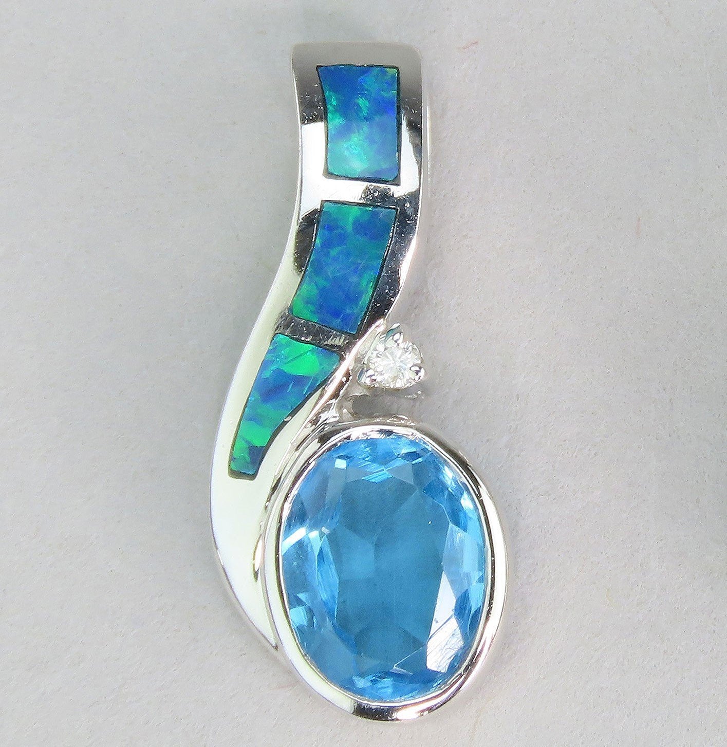 Sparkling 14k White Gold 1.3ct Oval Blue Topaz Opal Diamond Pendant