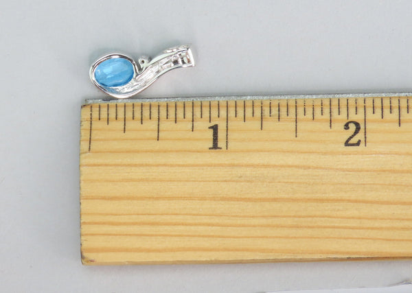 Sparkling 14k White Gold 1.3ct Oval Blue Topaz Opal Diamond Pendant