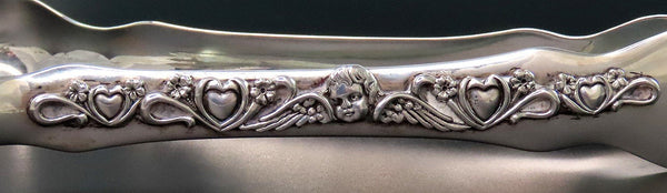 Charming Antique Sterling Silver Cherub and Hearts Design Ice Serving Tongs