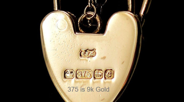 Vintage 1977 English 9k Yellow Gold Charm Bracelet with Heart Shaped Lock