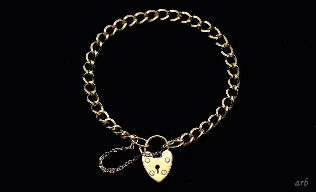 Vintage 1977 English 9k Yellow Gold Charm Bracelet with Heart Shaped Lock