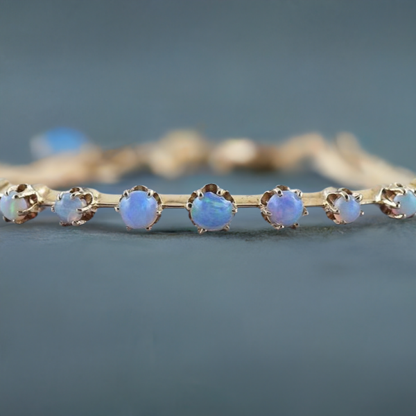 Beautiful 14k Gold & Graduated Opal Bangle Bracelet