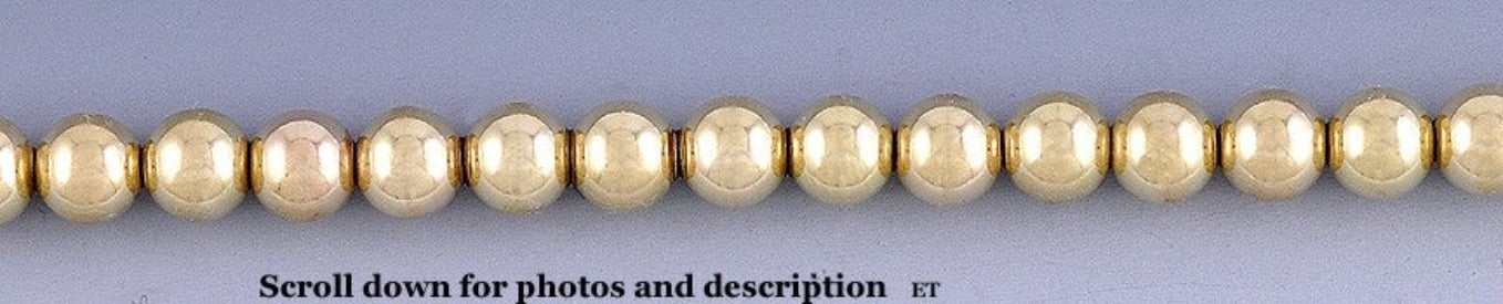 Fantastic Modern Necklace Strand of 6.5mm 14K Gold Beads
