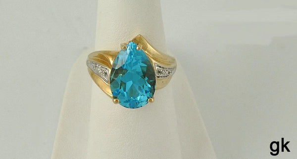 Brilliant 10K Yellow Gold Blue Topaz and Diamond Ring Size 6 Tear Drop