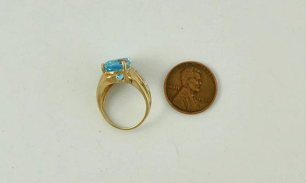 Brilliant 10K Yellow Gold Blue Topaz and Diamond Ring Size 6 Tear Drop
