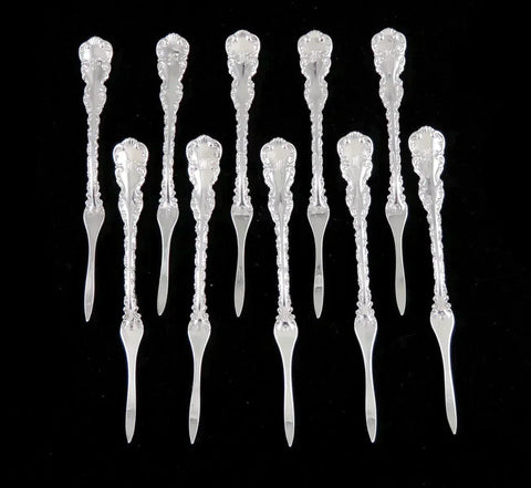 10 antique sterling silver lobster picks by Whiting in the Louis XV pattern.