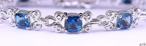 Dazzling Sterling Silver Link Bracelet London Blue Topaz Stones