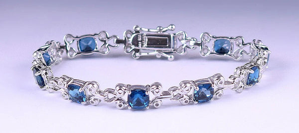 Dazzling Sterling Silver Link Bracelet London Blue Topaz Stones