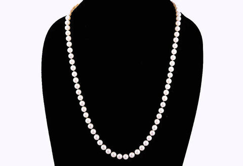 Lovely Necklace of Individually Knotted White Pearls and 14k Yellow Gold Clasp