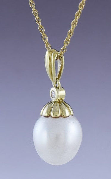 Elegant 18k Gold Diamond & Baroque Pearl Pendant