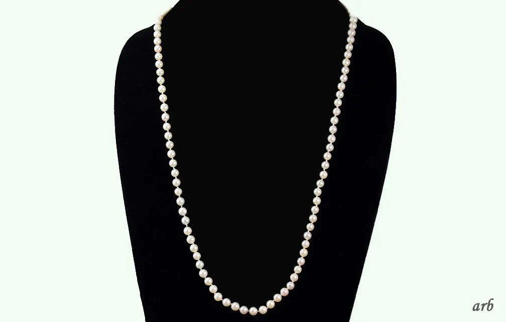 Necklace of Individually Knotted White Pearls w/ 14k White Gold Filigree Clasp