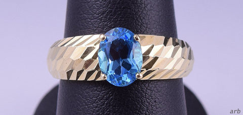 Sparkling 14k Yellow Gold Vibrant Blue Topaz Ring Size 6.75