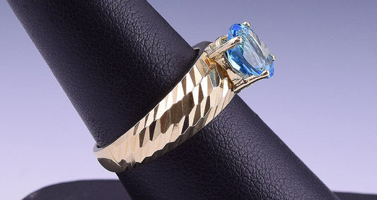 Sparkling 14k Yellow Gold Vibrant Blue Topaz Ring Size 6.75