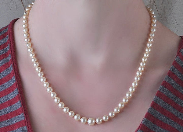 Graduated and Knotted Strand of Pearls Necklace w/14K White Gold Clasp