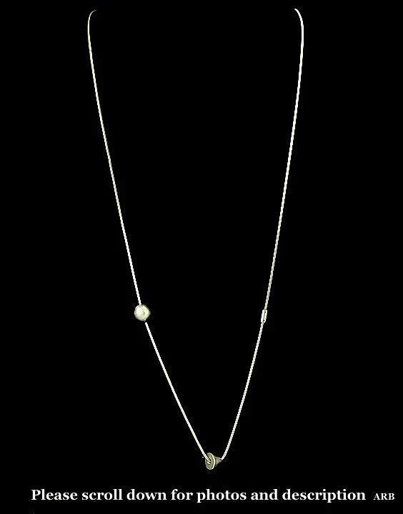 Striking Geometric Sterling Silver 36 inch Dangling Necklace