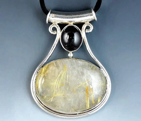 Gorgeous Sterling Silver w/ Bezel Set Rutilated Quartz and Red Stone Pendant